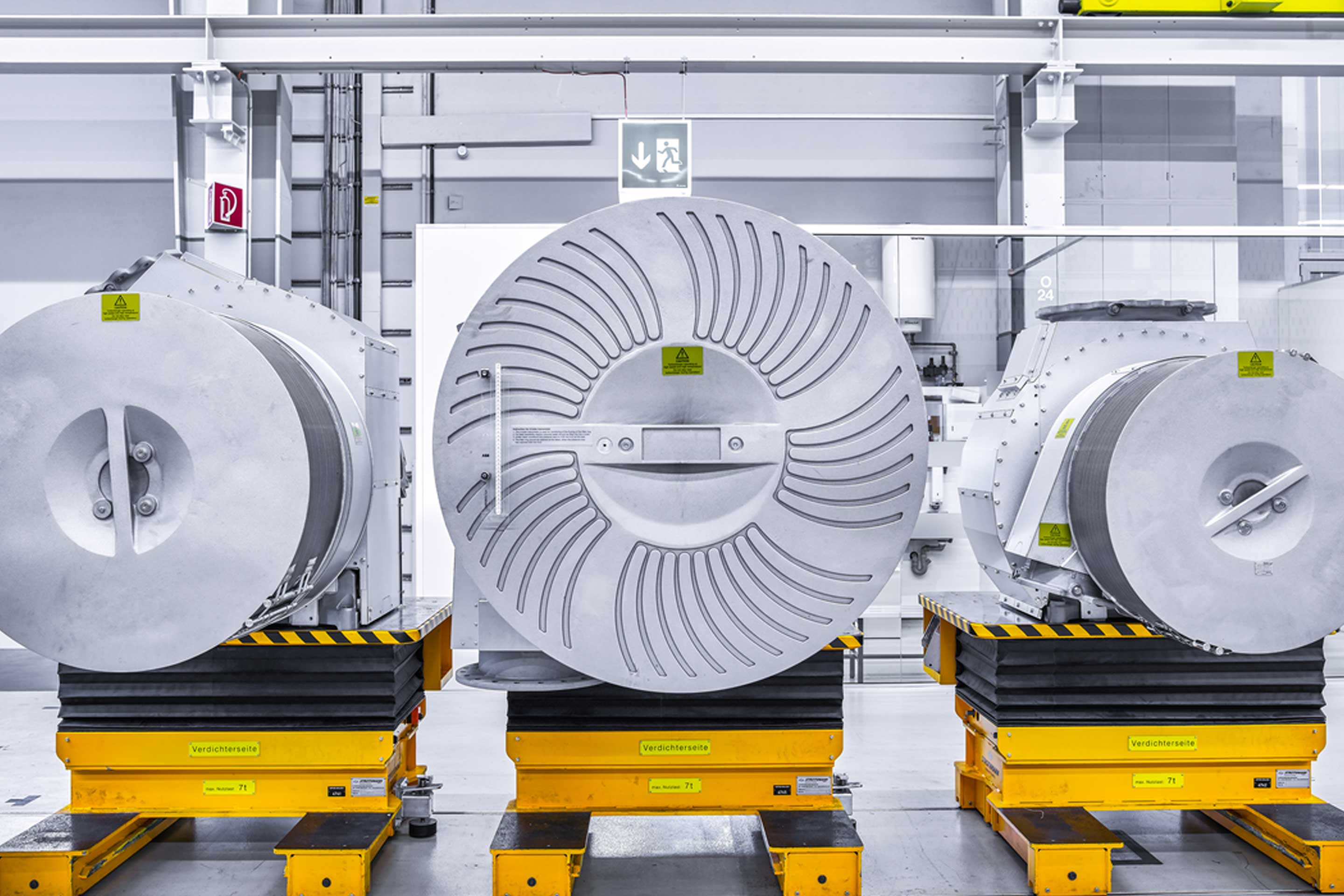 An image of Accelleron's TPL67-C36 A170-L and TPL71-C35 turbochargers in a row