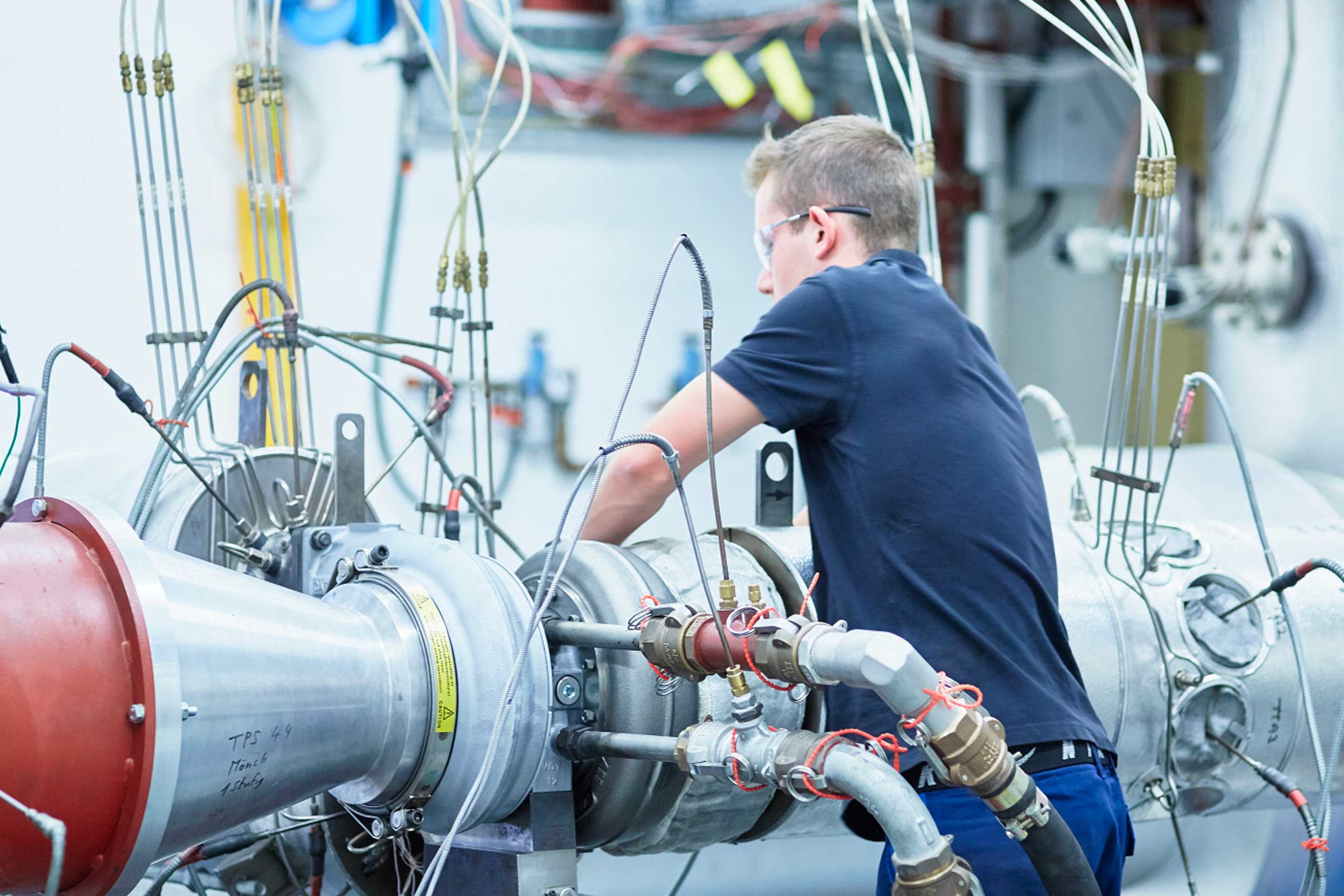 An ABB engineer working on an ABB turbocharger