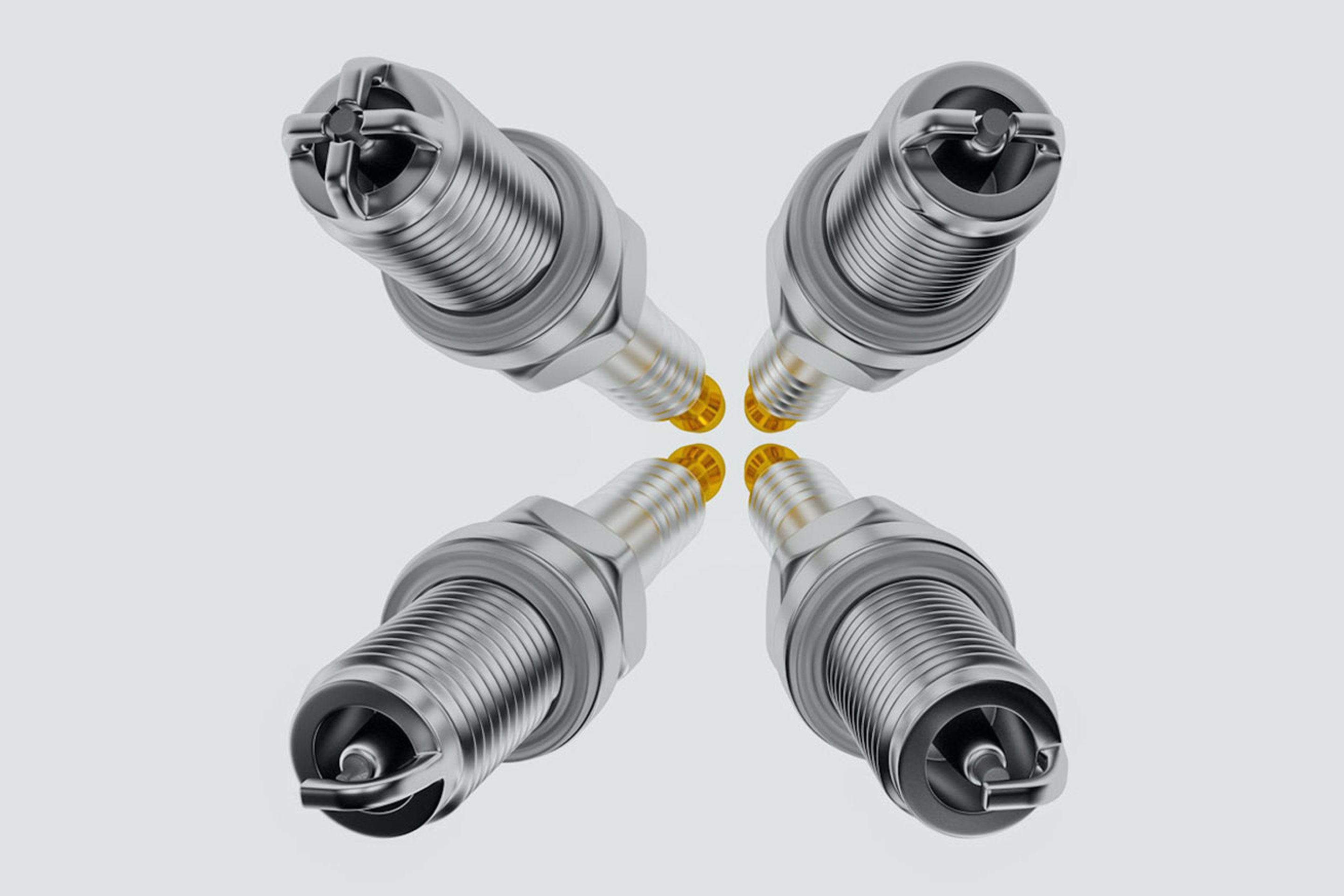 An image showing four spark plugs